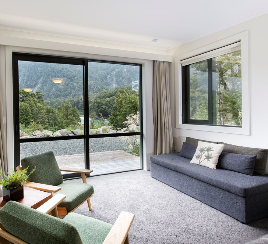 The sitting area at Milford Sound Lodge Mountain View Chalet.