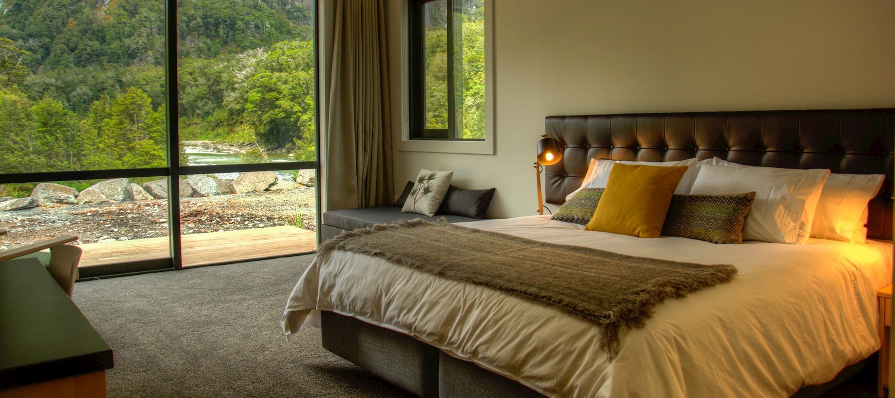 The bedroom in the Riverside Chalet and Milford Sound Lodge, Milford Sound accommodation.
