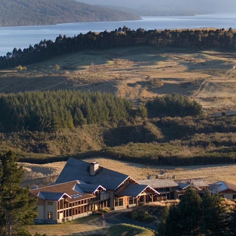 Birds Eye view over Fiordland Lodge with Lake Te Anau in the background.