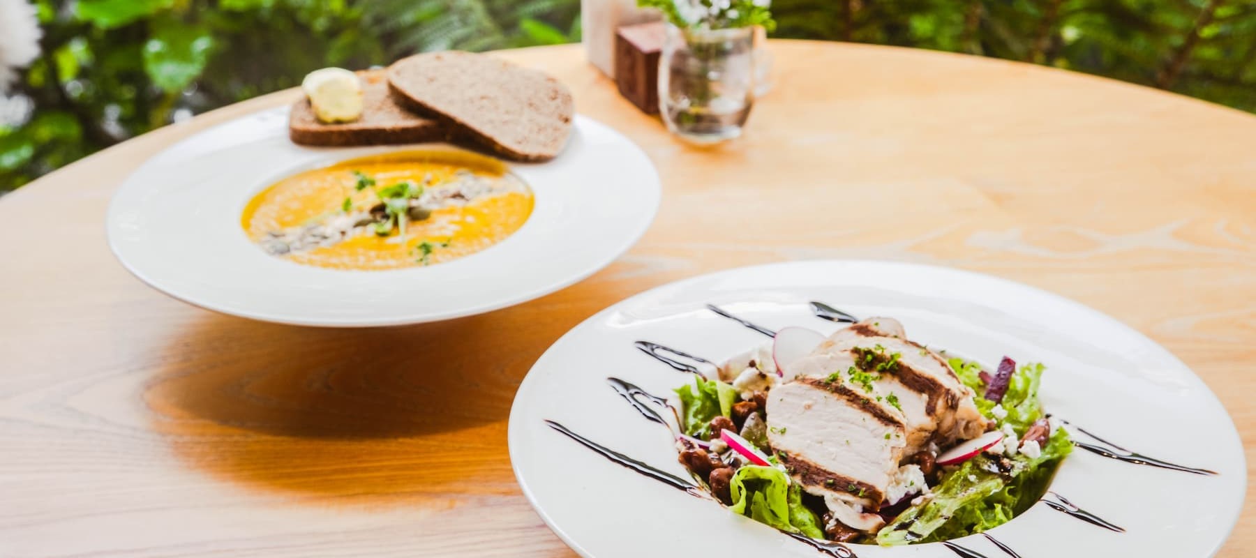 Pumpkin Soup and Chicken Salad served at Pio Pio Restaurant Milford Sound